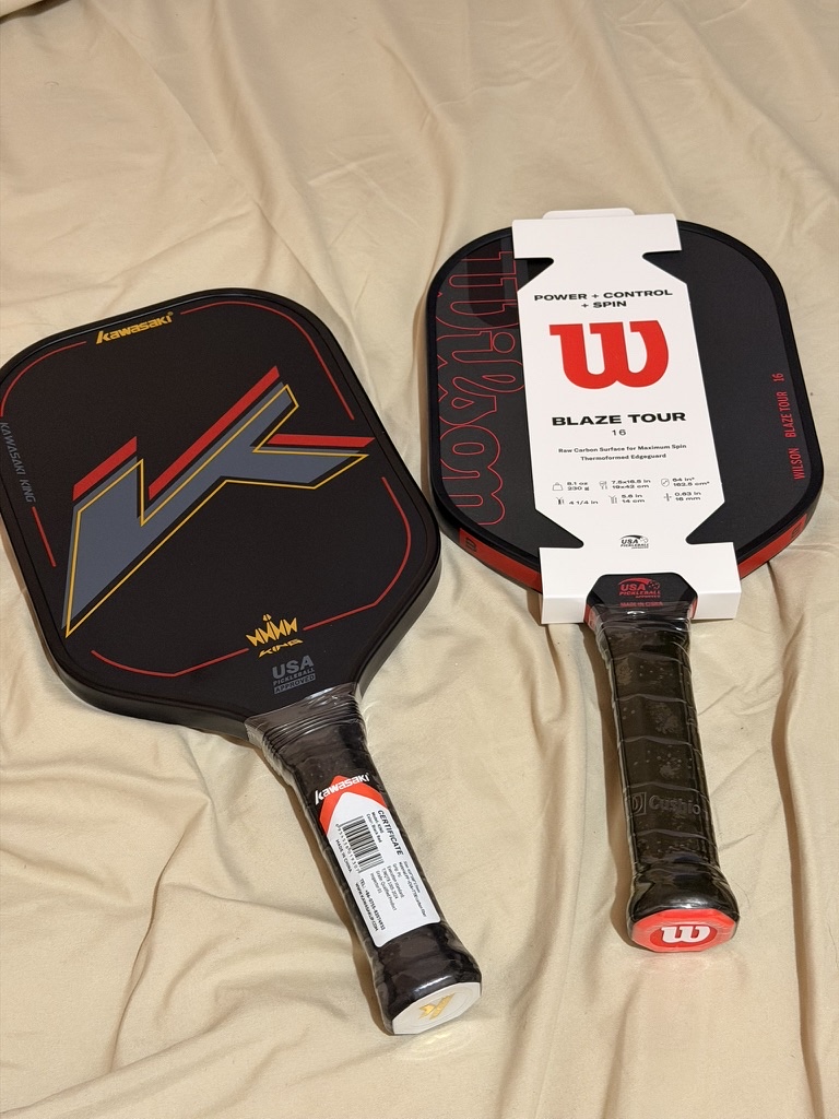 Side-by-side: the Kawasaki I borrowed and the Wilson Blaze Tour 16mm I bought